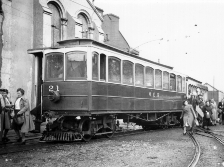 Wartime services on the M.E.R with Car No.21 in 1943, carrying austerity livery with slatted headlight and blackout curtains. © Website Collection